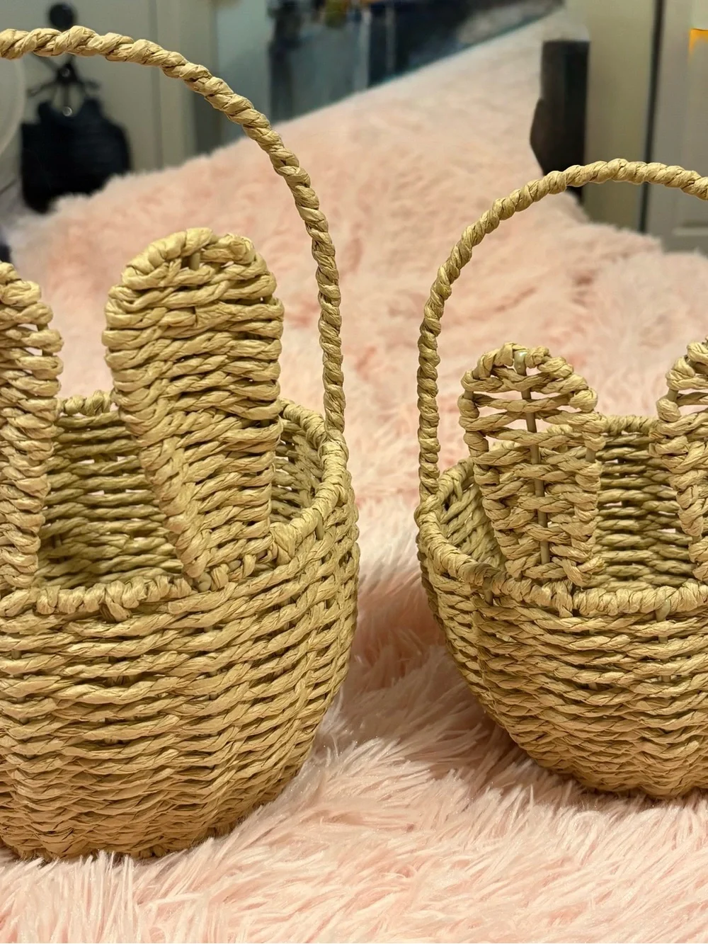 Homemade woven wicker and rattan bunny ear baskets.
